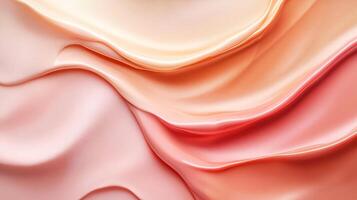 Pink and orange fabric with a wave pattern. The colors are bright and the fabric appears to be made of a shiny material photo