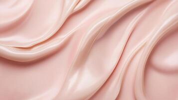 Pink fabric with a pattern of waves. The fabric is soft and smooth to the touch. The waves are gentle and flowing, giving the fabric a sense of calmness and serenity. Scene is peaceful and relaxing photo
