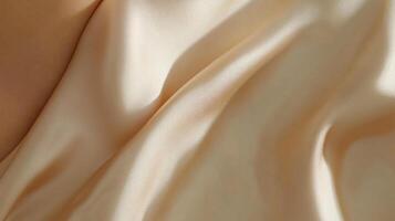 Piece of fabric with a pattern on it. The fabric is light in color and has a smooth texture photo