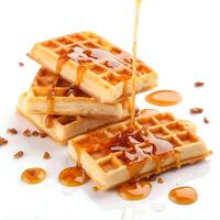 Waffle with sugar syrup isolated on white background photo
