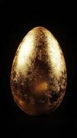 Golden egg shining against a black background creates striking visual contrast and allure photo