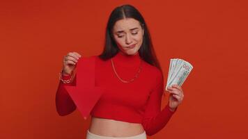 Upset woman showing red arrow pointing down, concept of downgrade bankruptcy money dollar fail, fall video
