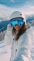 Young woman enjoys skiing on a sunny day in the mountains with a joyful expression photo