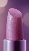 Vibrant pink lipstick close up showcases texture and shine in a soft light photo