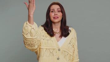 Displeased woman gesturing hands with irritation, displeasure, blaming scolding for failure, quarrel video