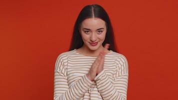 Sneaky cunning young woman with tricky face scheming evil plan, cheats, jokes and pranks video
