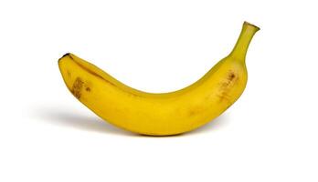 Single ripe banana isolated on white background with shadow photo