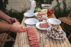 Preparing a flavorful barbecue feast in a vibrant backyard setting photo