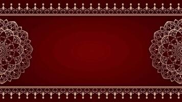 A red and gold background with a decorative pattern video