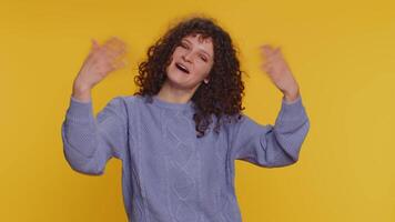 Woman showing inviting gesture with hands, ask to join, beckoning to coming, gesturing hello goodbye video