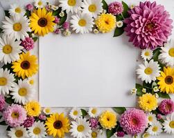 a piece of white paper surrounded by various colorful and beautiful flowers. suitable for invitations and accessories that require a beautiful and beautiful appearance. photo
