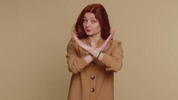 Woman say No hold palm folded crossed hands in prohibited access stop gesture, danger, finish video