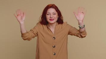 Woman showing inviting gesture with hands, ask to join, beckoning to coming, gesturing hello goodbye video