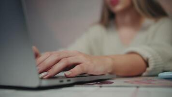 Hands Typing on Laptop Keyboard in Office Setting video
