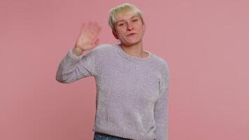 Woman showing inviting gesture with hands, ask to join, beckoning to coming, gesturing hello goodbye video