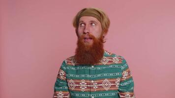 Funny joyful man making playful silly facial expressions, grimacing, fooling around showing tongue video
