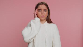 Woman rubbing temples to cure headache problem, suffering from tension and migaine, stress, pain video