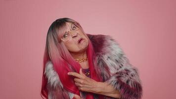 Funny joyful woman making playful silly facial expressions, grimacing, fooling around showing tongue video