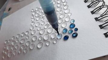 Intricate bead art creation in progress handcrafting with precision and colorful beads on canvas. video