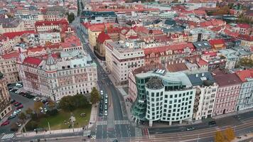 Prague cityscape with dancing House or Fred and Ginger building. Aerial view of modern architecture and historical buildings in European city. Prague, Czech Republic - October 27, 2024 video