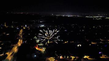 A view of fireworks from the top of a building video
