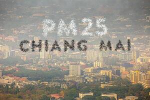 Fog or haze combined with smoke and other atmospheric pollutants in the city from PM 2.5 dust. Cityscape with word of PM 2.5 and air pollution. PM 2.5 concept. photo