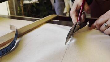 Cutting the Thick Fabric with Scissors in The Tailor Workshop video