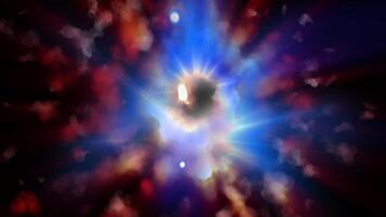 A unique spectacle. A bright purple, violet spiral galaxy consisting of thousands of luminous particles smoothly changes perspective, emitting spectacular waves into space. video