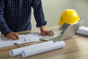 Architect engineer design working on blueprint planning concept photo