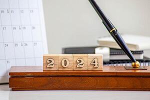 From 2023 to 2024. Merry Christmas and Happy New Year, White background.2024 new year idea concept. photo