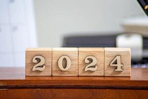From 2023 to 2024. Merry Christmas and Happy New Year, White background.2024 new year idea concept. photo