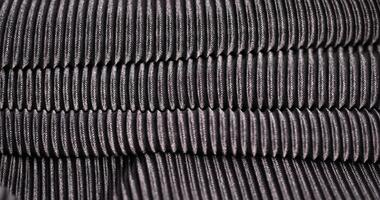 black fabric made of soft synthetic material close-up photo