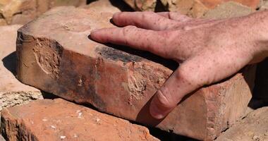 different types of bricks after dismantling the old building photo