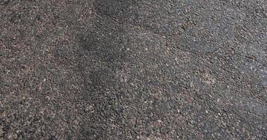 a part of a highway covered with asphalt photo