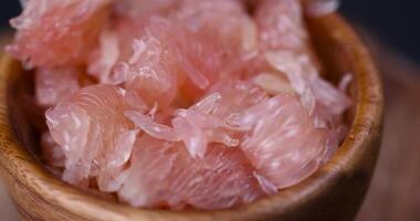 peeled citrus grapefruit without peel on the table photo