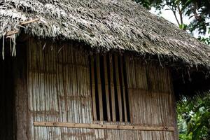 Closeup of Wooden Window in Indigenous Hut in Amazon Jungle photo
