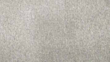 A white fabric with a pattern of small squares photo