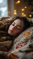Young woman peacefully sleeping on a cozy bed with soft blankets and pillows photo