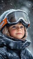 Excited child enjoying snowy winter day in mountains with ski gear photo