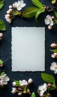 Elegant floral arrangement featuring blank space for notes or messages on dark background photo