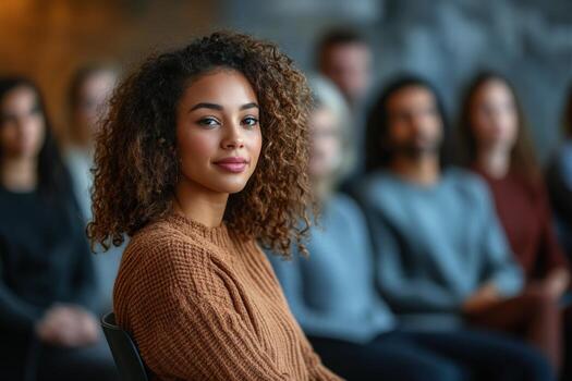 Group of women participating in a workshop focused on personal development in a bright, indoor space photo