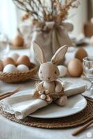 Easter table setting with decorative bunny and natural elements for spring celebration photo