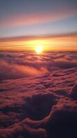 Sunset over the ocean with waves gently lapping against the shore in a tranquil coastal setting photo