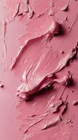 Beautiful shades of pink paint applied with texture on a canvas photo