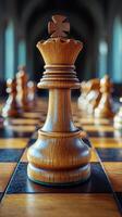 Elegant wooden king piece standing out on a chessboard during an outdoor match photo