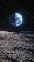Stunning view of Earth from the lunar surface under a starry sky photo