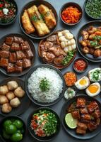 Delicious assortment of traditional dishes arranged on plates at a dining table photo