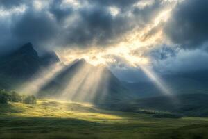 Majestic sunrise over mountains with radiant beams illuminating the valley photo