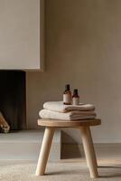 Relaxing home spa setting featuring towels and essential oils in a calming environment photo