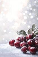 Fresh cranberries dusted with snow on a winter background with soft bokeh lights photo